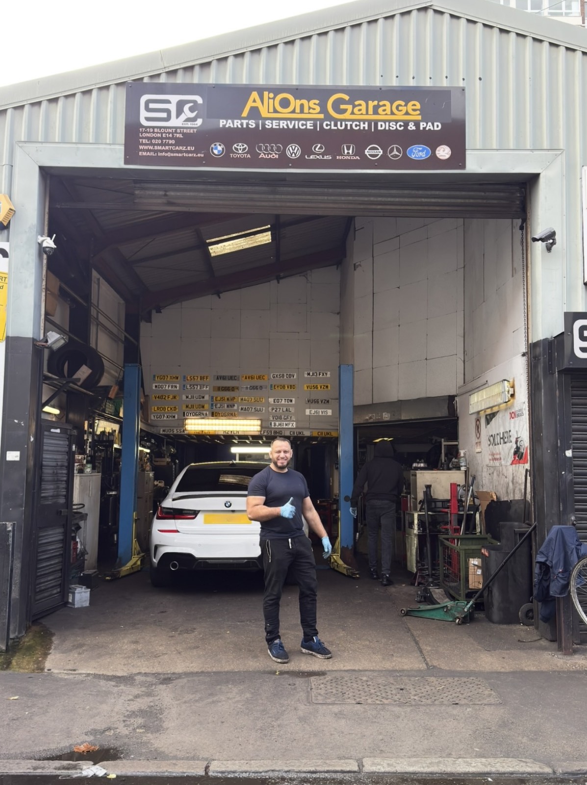 The AliOns Garage unit on Blount Street, Limehouse, with cars in the workshop bays